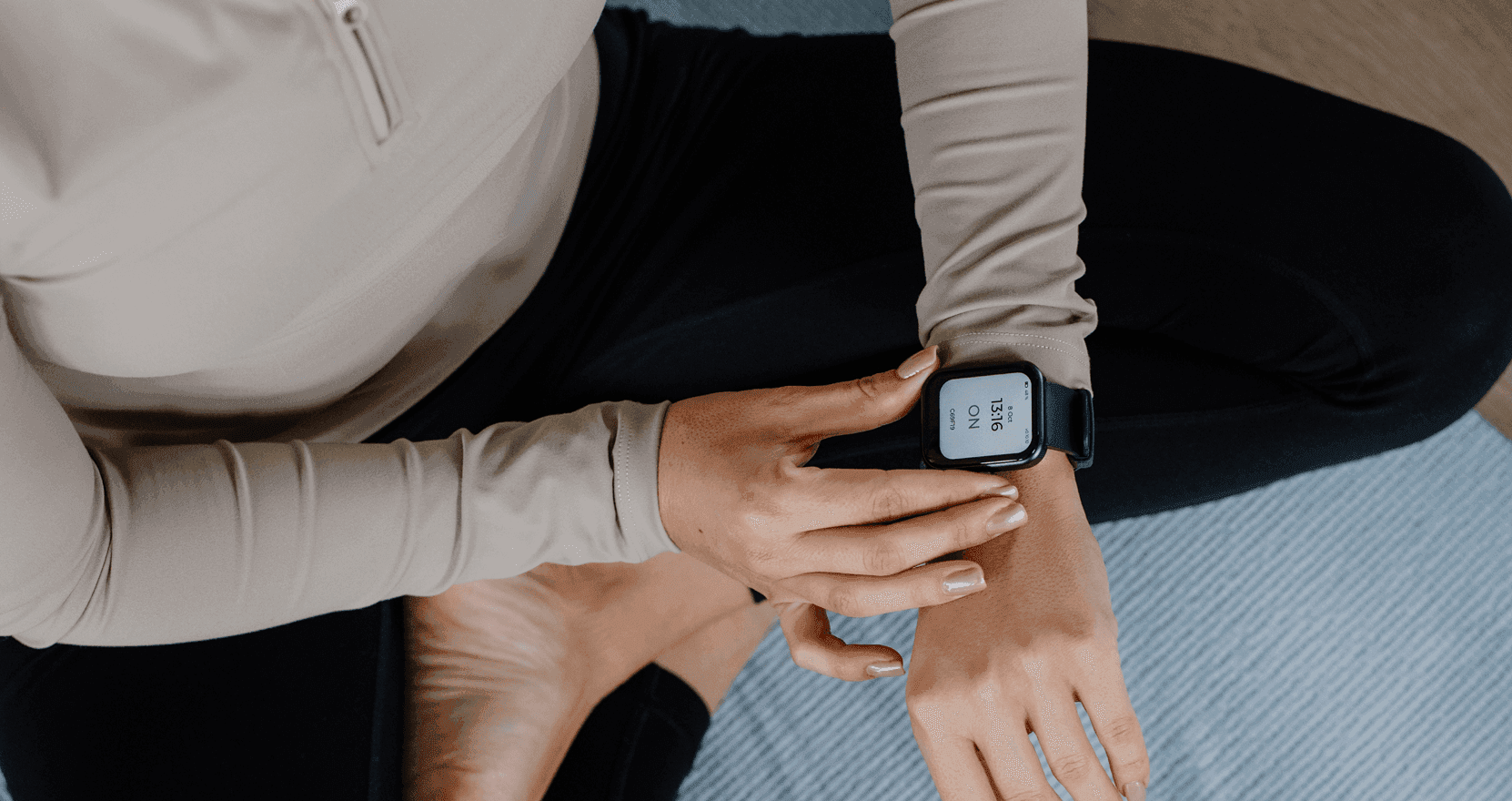 Person wearing the Hyfe CoughMonitor wearable device during daily activity